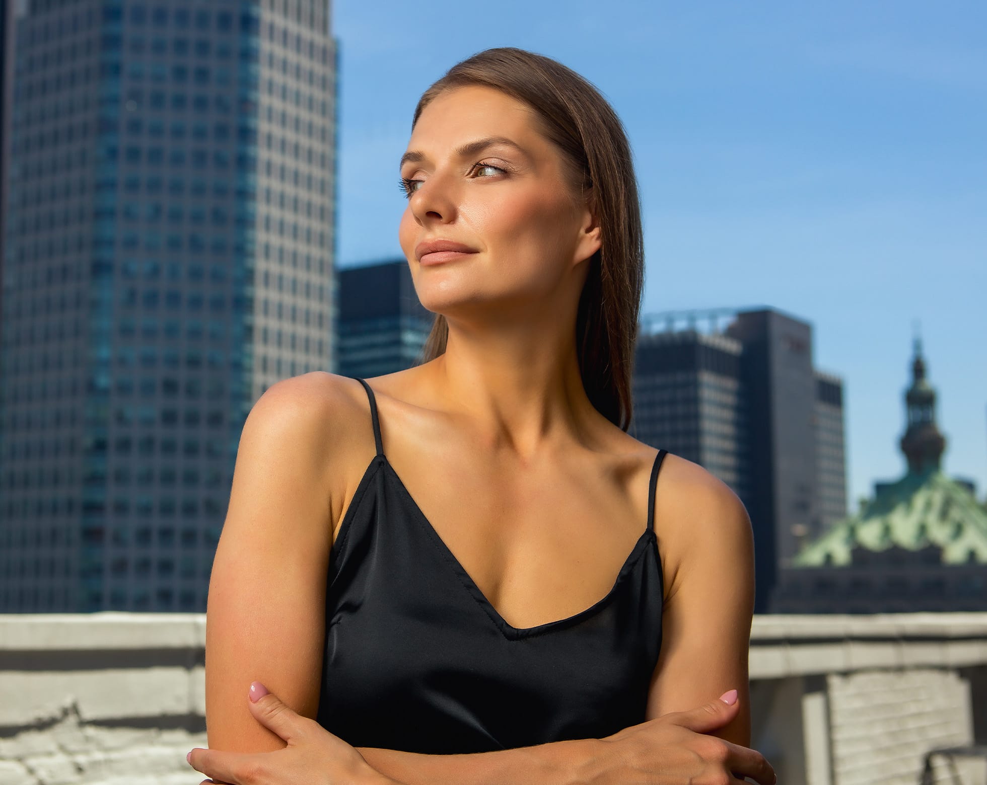 Woman smiling on a balcony