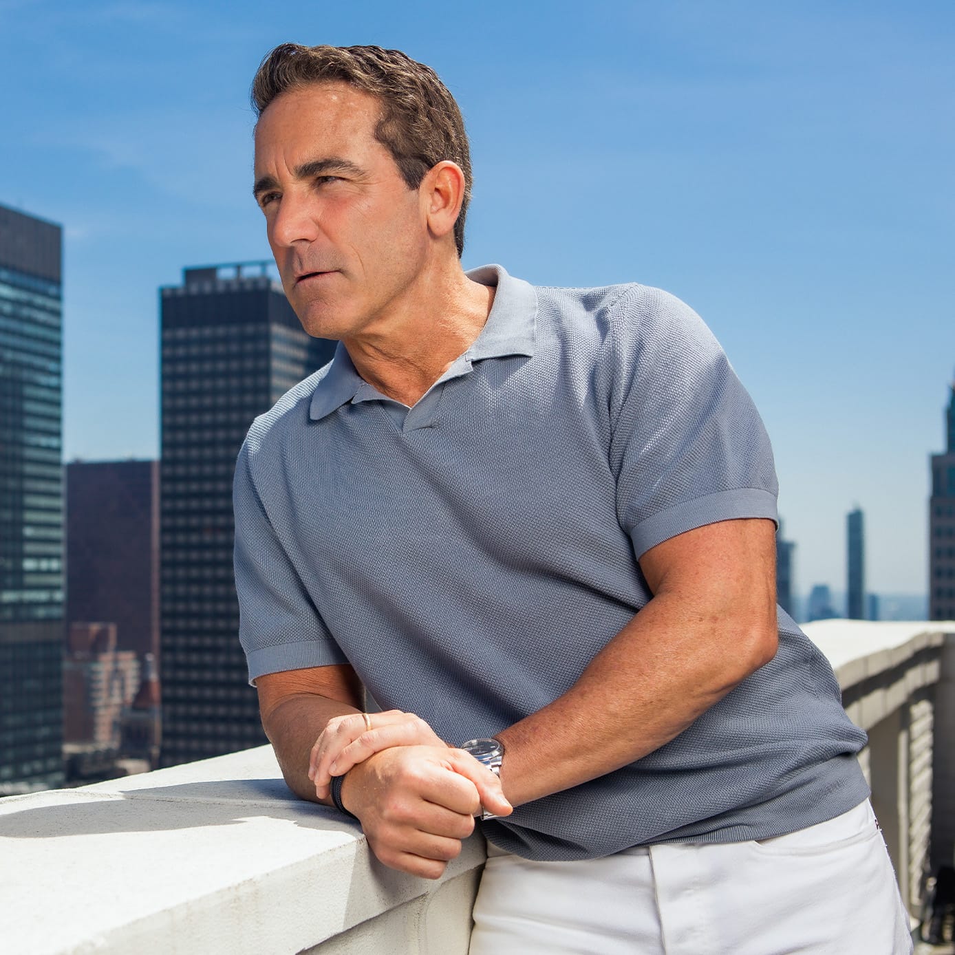 Man standing on a balcony