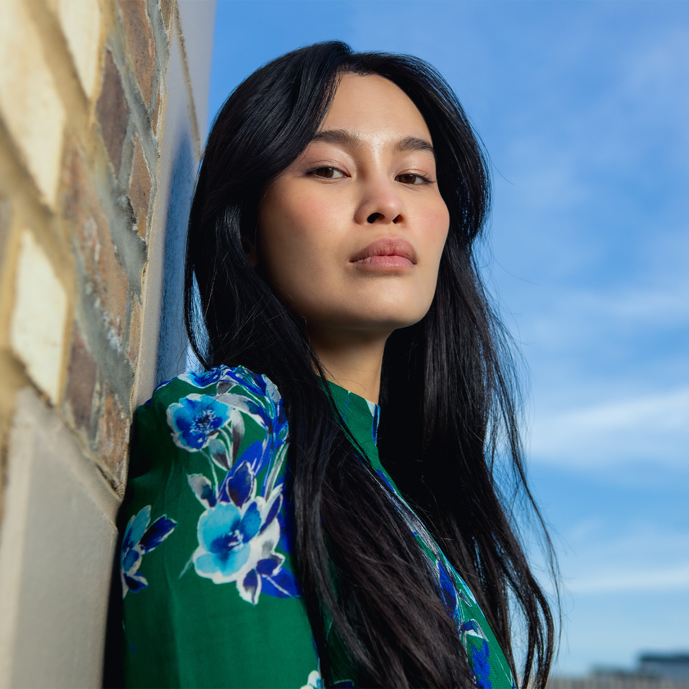 Woman smiling on a balcony