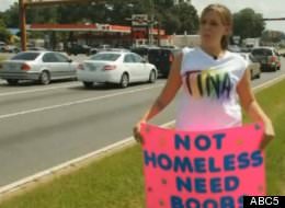 Woman Panhandles for Breast Augmentation